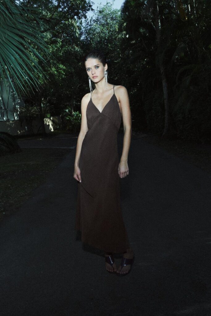Woman wearing Zw Collection Slip Dress – Long dress made of viscose and lyocell yarn. V-neck and thin straps crossed at the back. Flared hem.