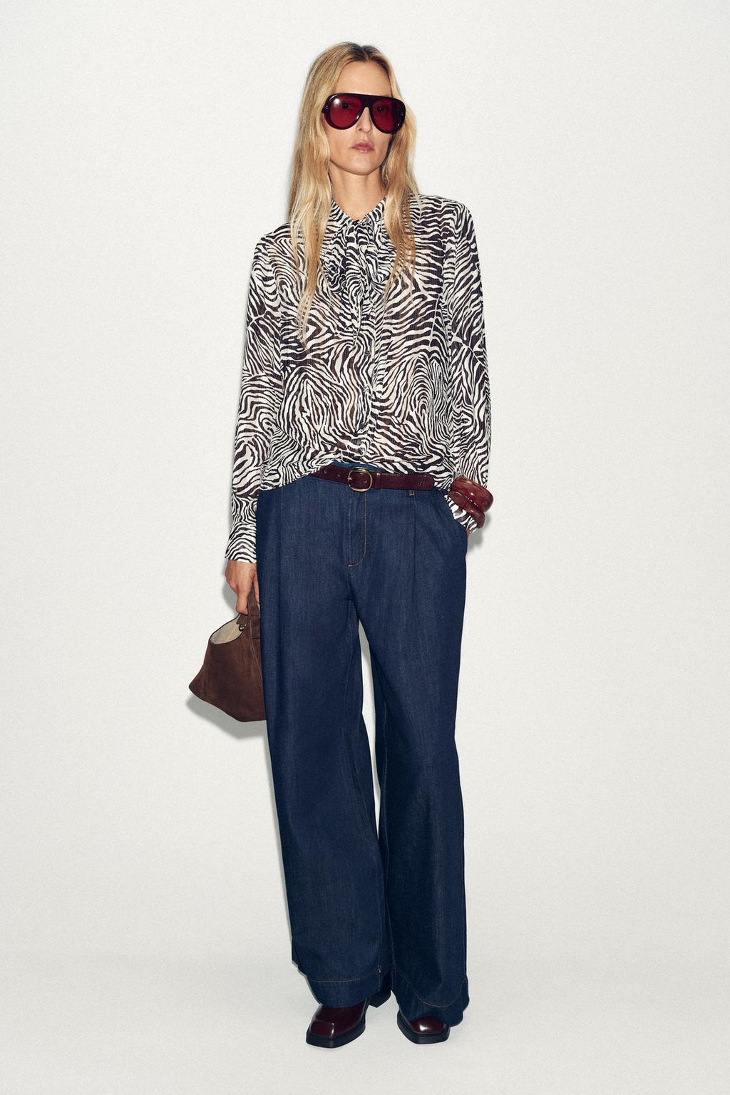 When it comes to concerts, your outfit is just as important as the music. Whether you’re dancing under the stars at a festival or singing along at a stadium show, the right look can make the night unforgettable. That’s why we’ve rounded up the 100 Best Concert Outfits, drawing major inspiration from Coldplay’s unique style and the vibrant energy of their live shows.