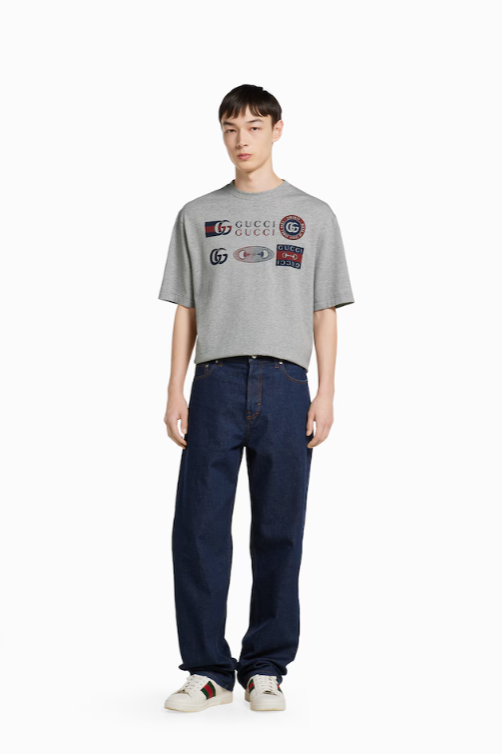 Man wearing Gucci's gray t-shirt