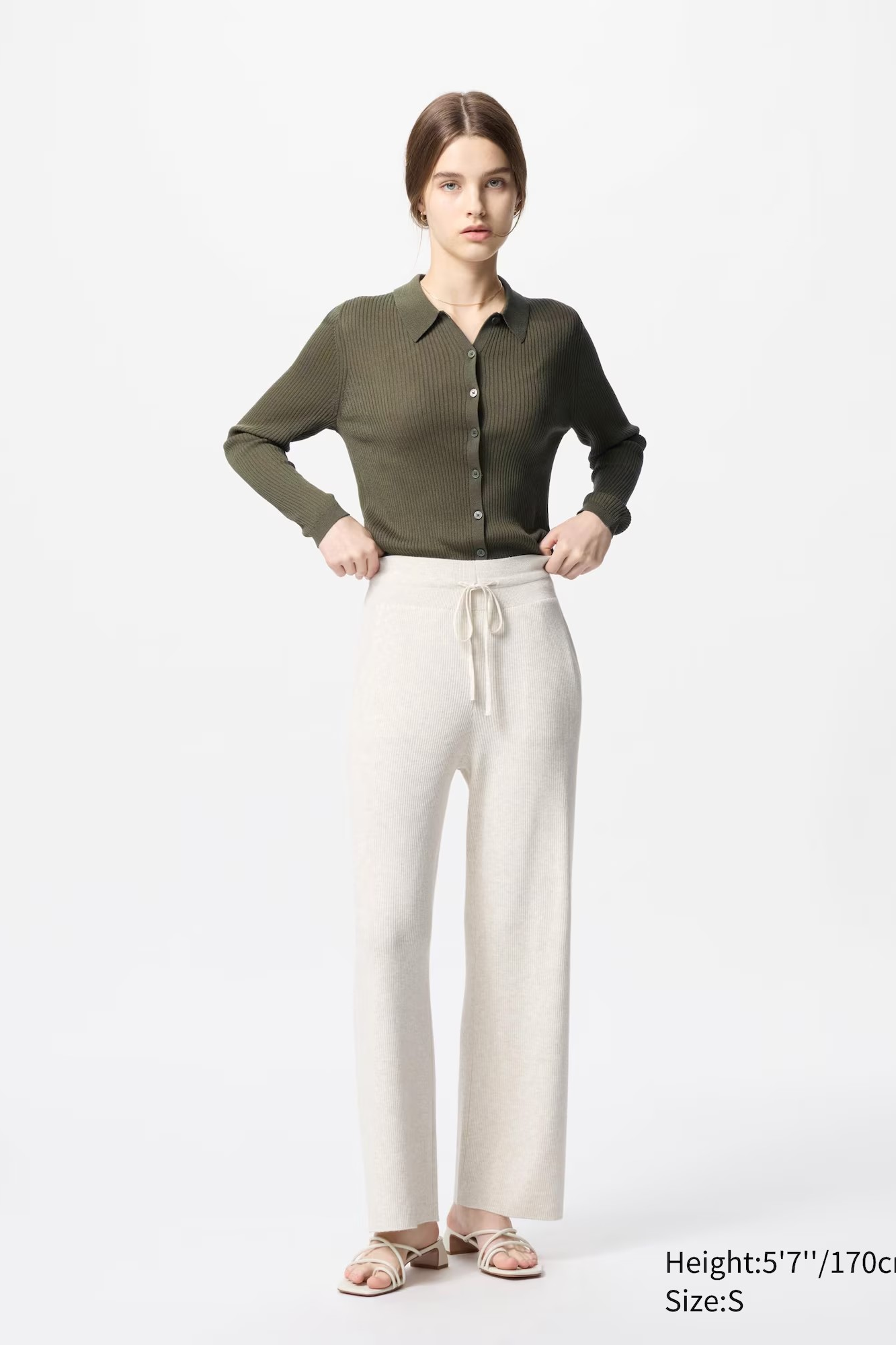 Model wearing a Uniqlo washable knitted trousers for Grandparents Day | Briondi